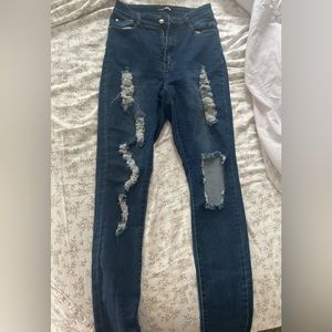 Fashion Nova Distressed blue jean